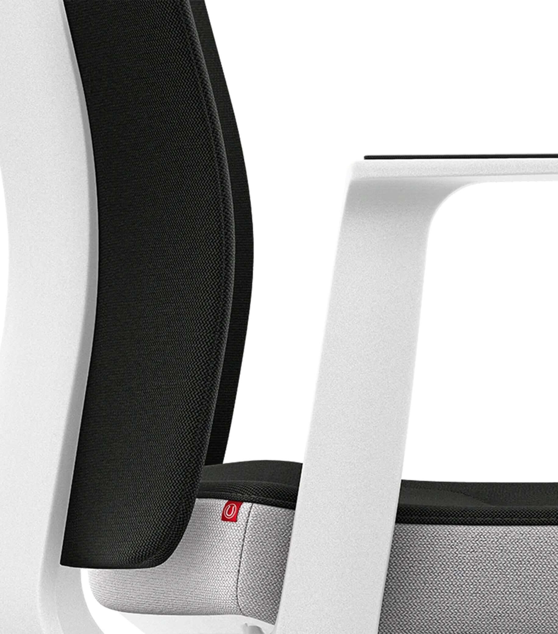 Ergonomic white office chair with padded backrest and Smart-Spring technology for active sitting and improved movement.