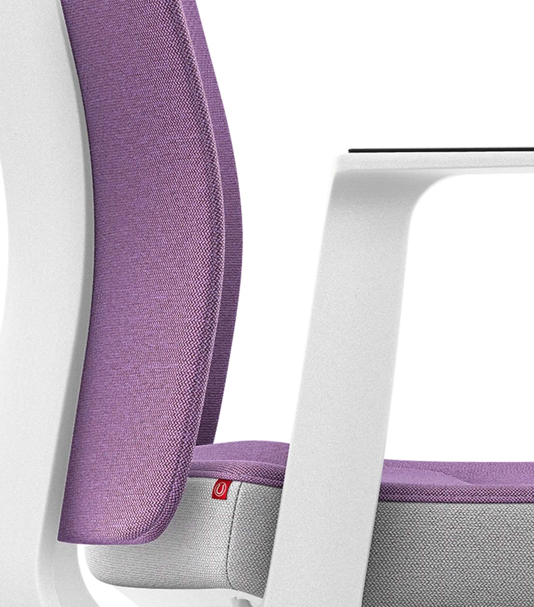 Purple padded backrest chair with Smart-Spring technology for ergonomic support and freedom of movement.