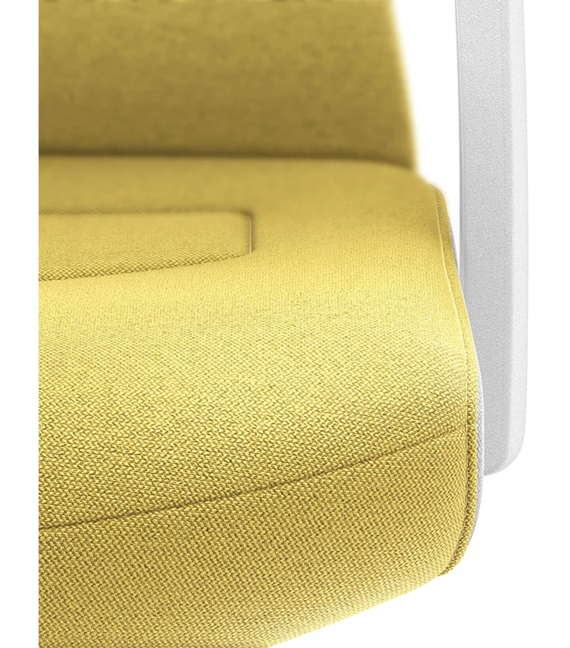 Close-up of a padded yellow seat with Smart-Spring technology for ergonomic seating and greater movement freedom.
