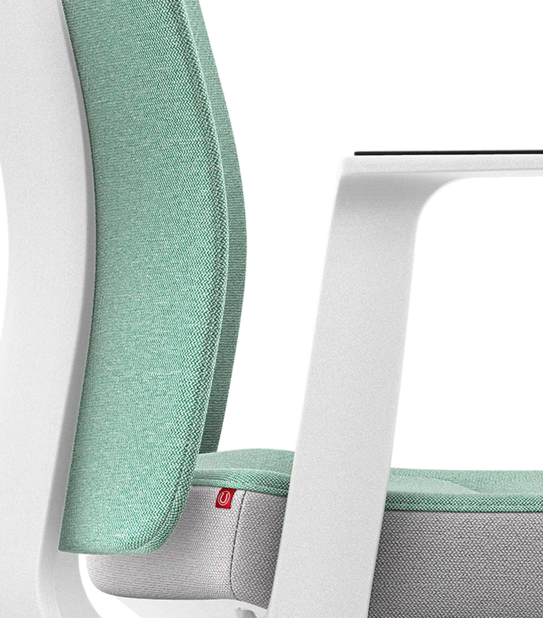 Ergonomic chair with Smart-Spring technology, padded backrest, and white frame for active sitting and enhanced mobility.