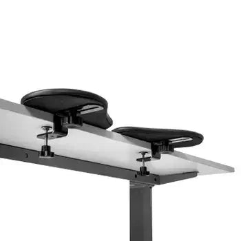 Black ergonomic 2-part arm support made of artificial leather attached to desk for enhanced comfort and style.