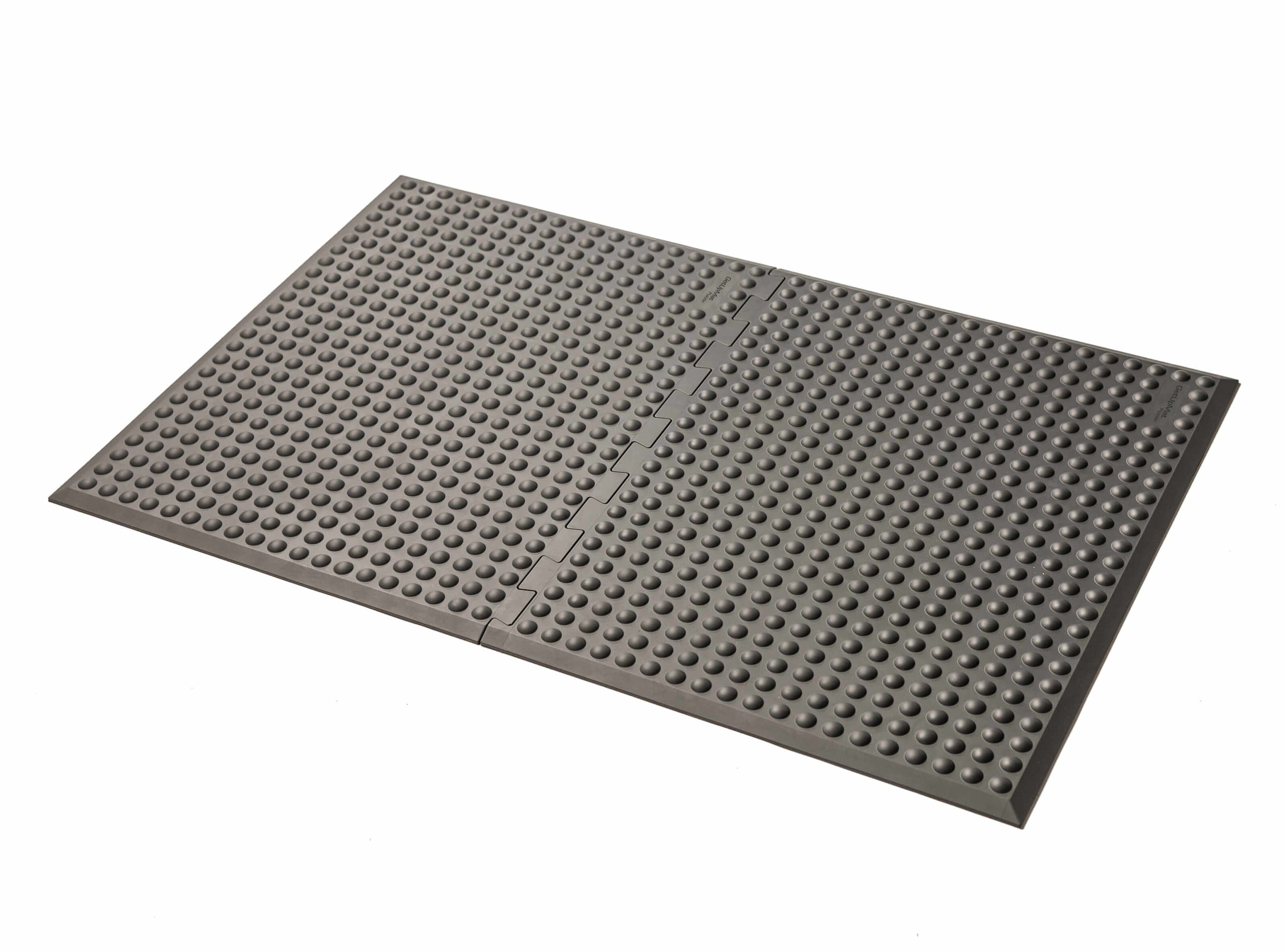 Grey GetUpMat Puzzle workstation standing mat for ergonomic comfort and customizable length in office settings.