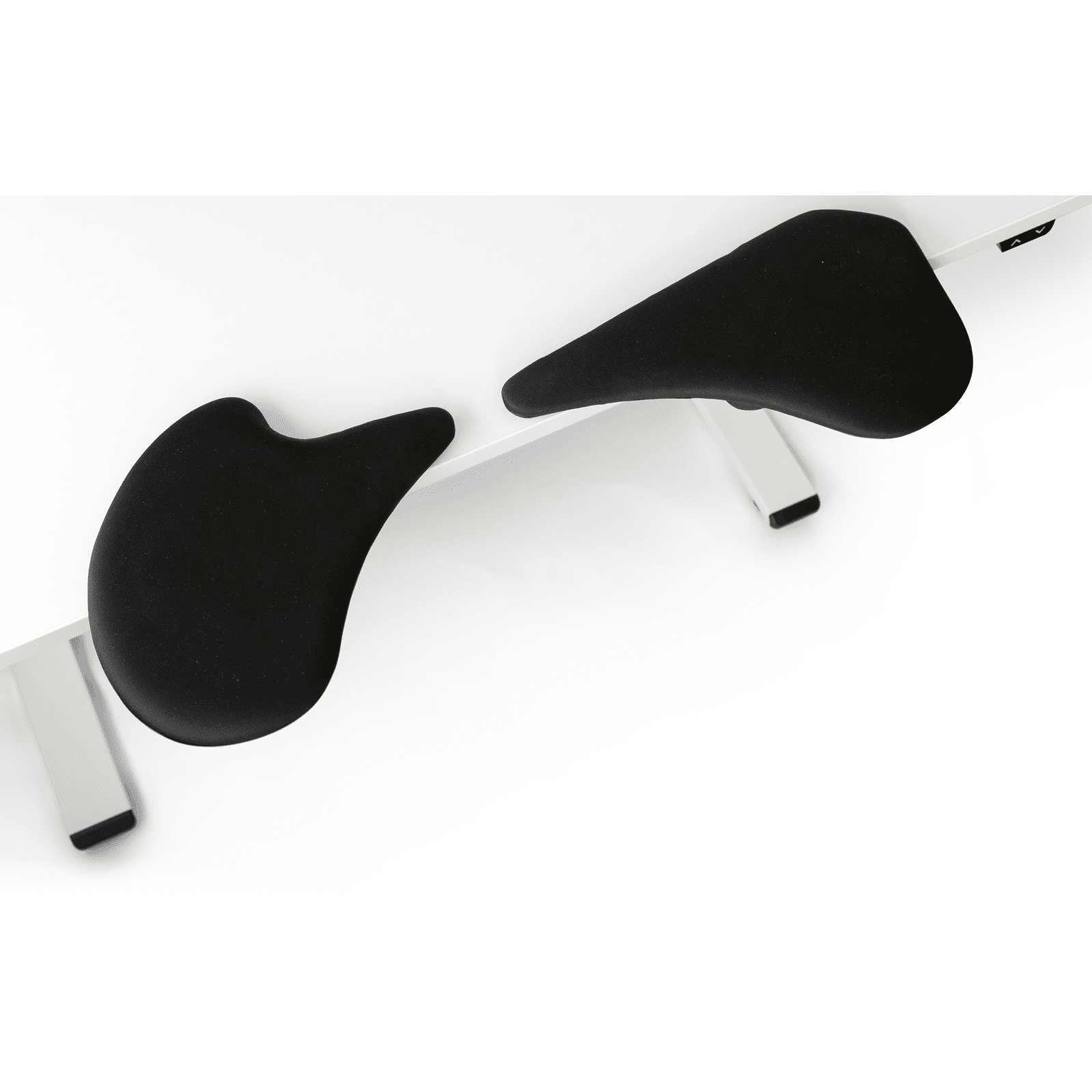 Ergonomic black 2-part arm support in faux leather on white desk, compatible with popular keyboards and mice, customizable for comfort.