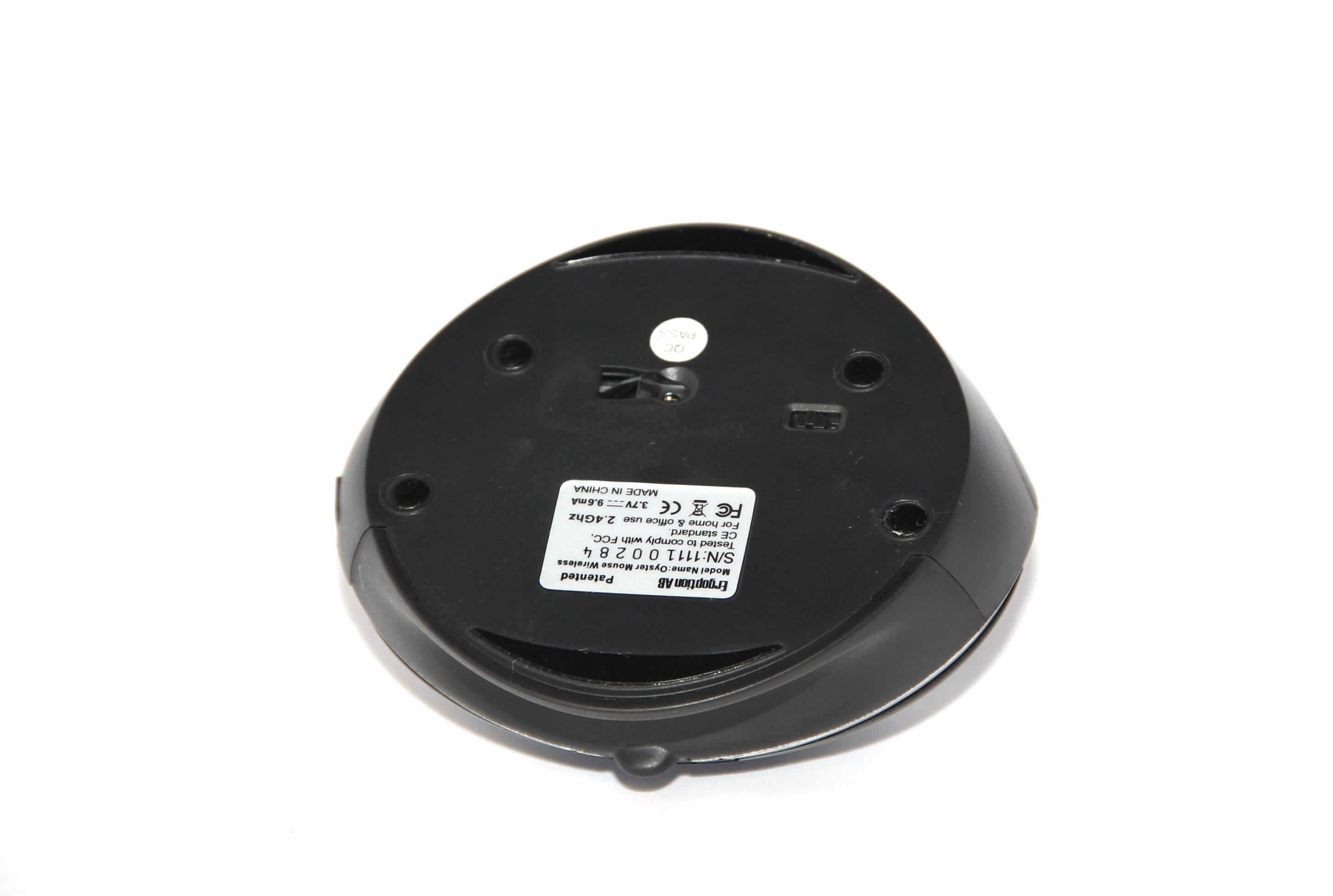 Bottom view of the OysterMouse ergonomic wireless mouse, showcasing its base design and product label.