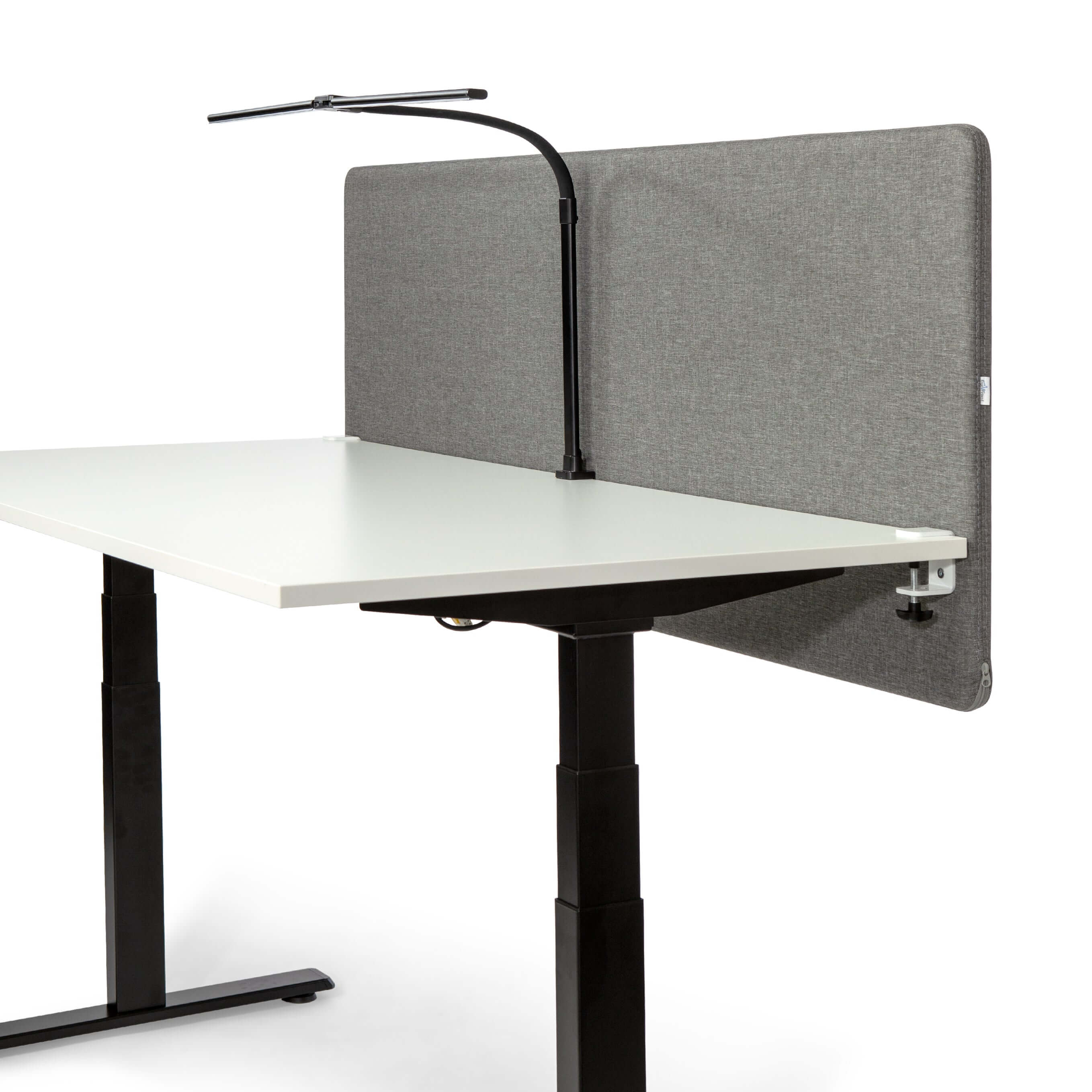 Adjustable ErgoFinland DUO LED desk lamp in black, mounted on a modern workstation, showcasing dual light heads and flexibility.