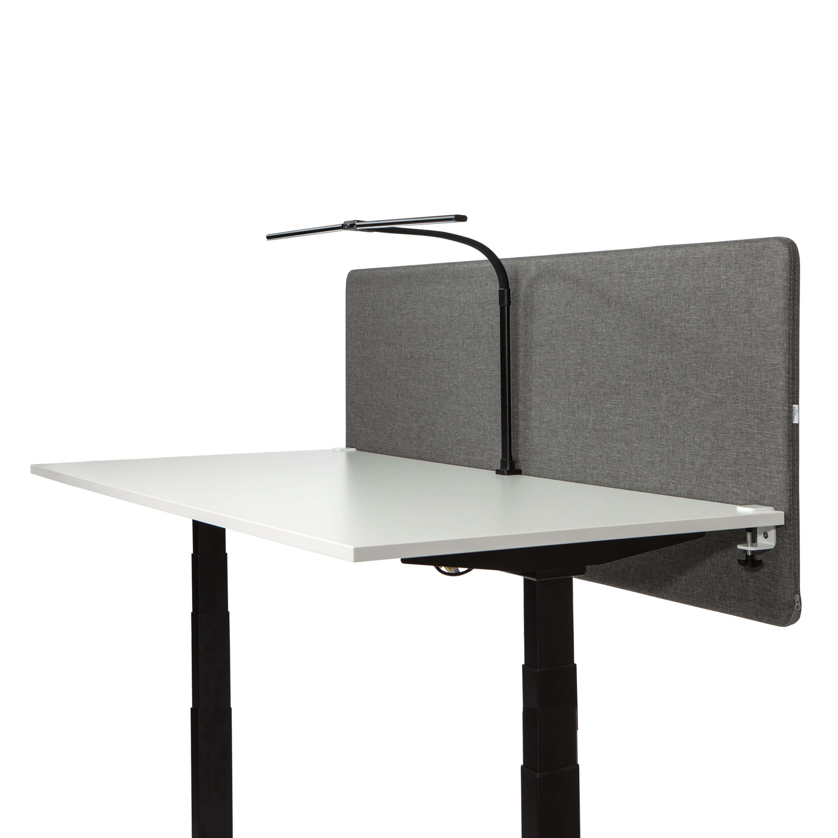 Black DUO LED desk lamp on adjustable workspace with gray partition.