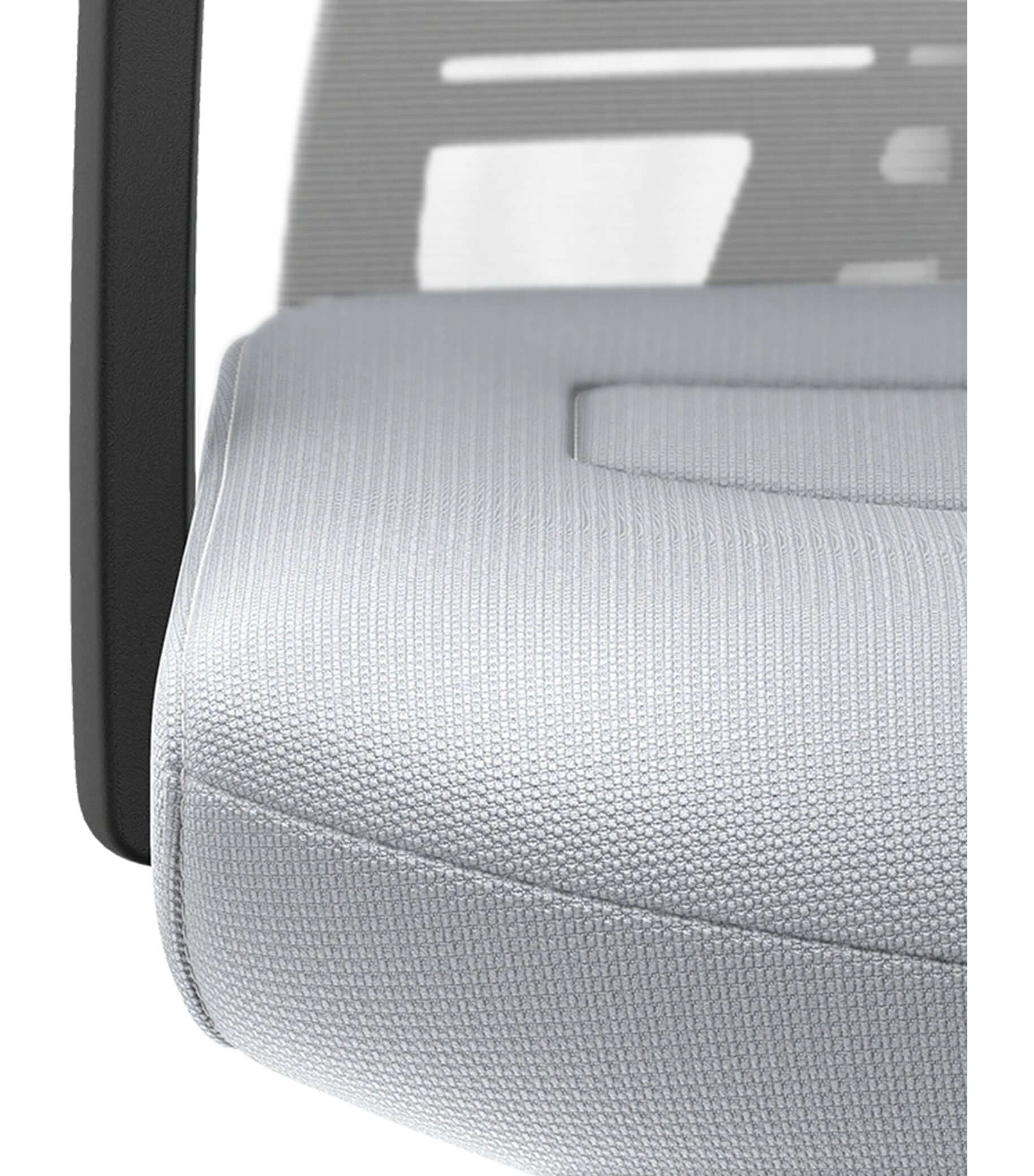 Close-up of PURE ACTIVE Edition #10 chair with white mesh back and Smart-Spring technology for ergonomic seating and freedom of movement.